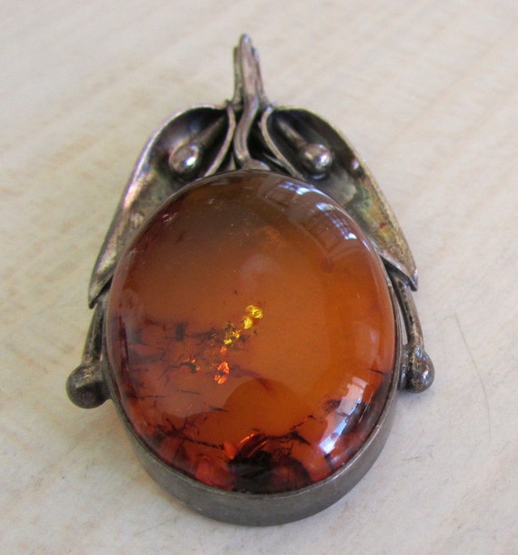 Sterling Silver and Amber Pendant +