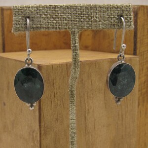 Sterling Silver and Faceted Dark Green Stone Dangle Earrings +