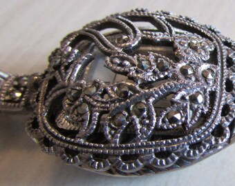 Sterling Silver and Marcasite Watch Pendant +