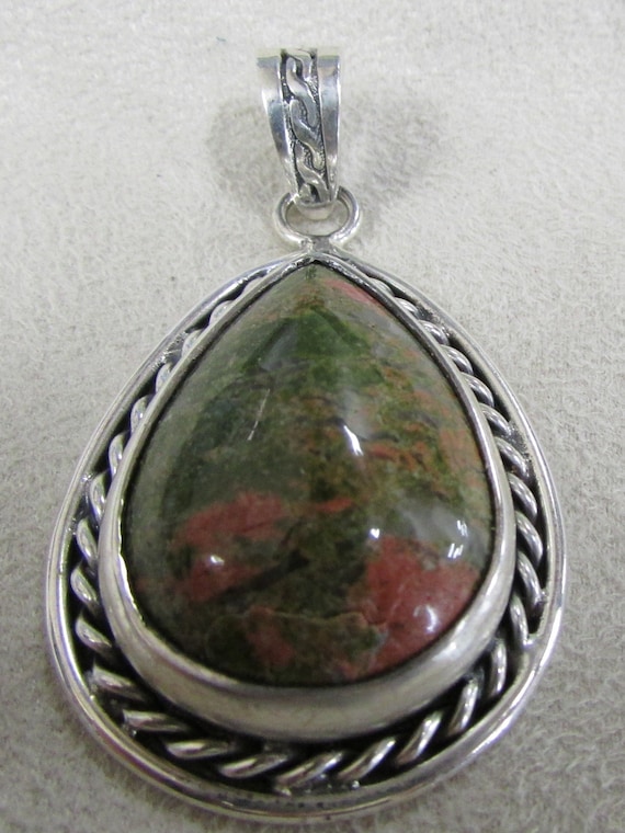 Sterling Silver and Unakite Pendant +