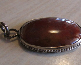 Sterling Silver and Reddish Agate Pendant +