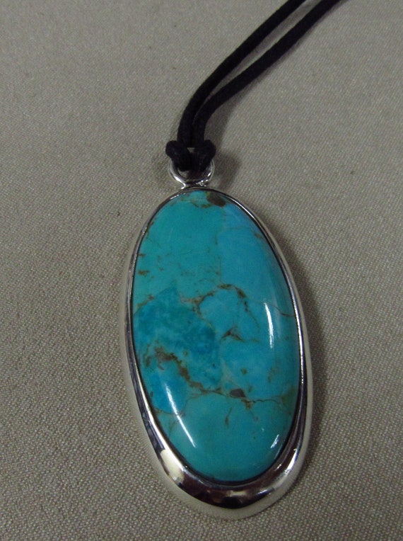 Sterling Silver Oval Barse Turquoise Necklace from