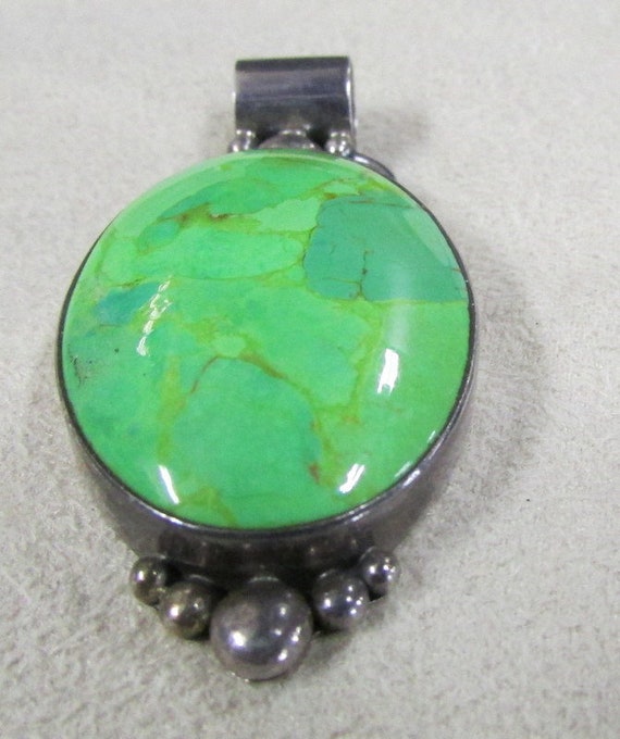 Sterling Silver and Chartreuse Stone Pendant +