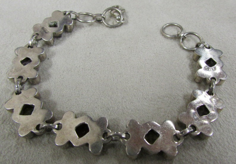 Sterling Silver Link Bracelet with Faceted Stones