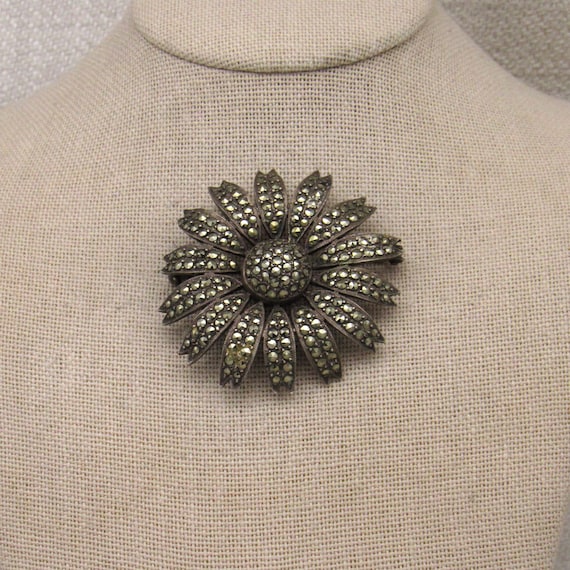 Sterling Silver and Marcasite Daisy Pin +