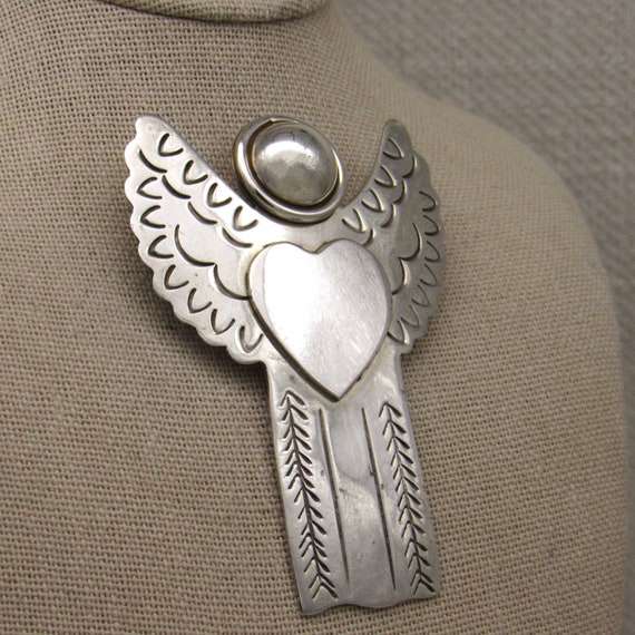 Sterling Silver Angel with a Heart Pin From Mexic… - image 2