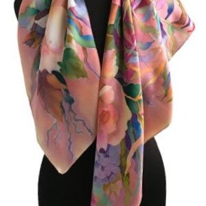 May include: A square silk scarf featuring a soft peach background with a hand-painted floral pattern in shades of purple, green, blue, and dark brown. The scarf displays flowing botanical motifs and abstract leaf shapes draped over a black mannequin.