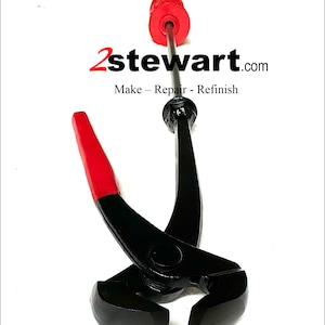 May include: Black metal pliers with a red handle. The pliers have a rounded jaw and a long handle. The pliers are used for bending metal.