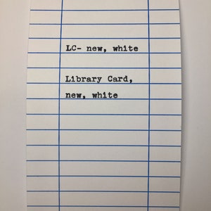 May include: A white library card with blue lines and the text "LC - new, white" and "Library Card, new, white".