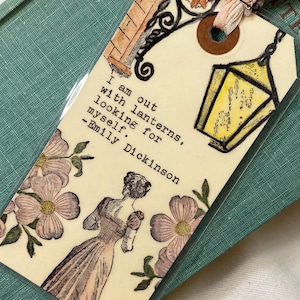 Bookmark- Emily Dickinson Quote typed on laminated art tag- I am out with lanterns
