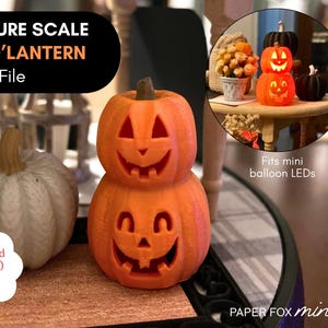 May include: A 3D printed orange jack-o'-lantern stack with two carved faces and a brown stem, accompanied by a white textured pumpkin. Text reads: MINIATURE SCALE JACK O'LANTERN 3D Print File, Instant download (STL file), and Fits mini balloon LEDs.