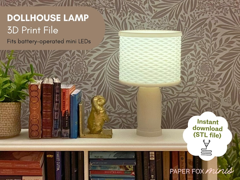 May include: A miniature dollhouse lamp with a textured white lampshade and base. The lamp is next to a shelf with miniature books and a gold-colored bookend. Text on the image reads "DOLLHOUSE LAMP 3D Print File Fits battery-operated mini LEDs".