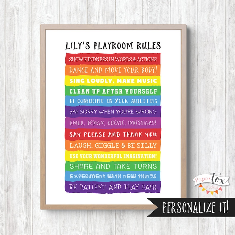 May include: A printable poster with a rainbow background and the text "LILY'S PLAYROOM RULES" in black. The rules are listed in a column on the right side of the poster, with each rule written on a different colored stripe of the rainbow. The rules are: Show kindness in words and actions, Dance and move your body!, Sing loudly, make music, Clean up after yourself, Be confident in your abilities, Say sorry when you're wrong, Build, design, create, investigate, Say please and thank you, Laugh, giggle & be silly, Use your wonderful imagination!, Share and take turns, Experiment with new things, Be patient and play fair.