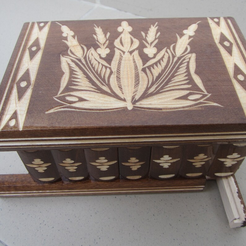 puzzle box with hidden compartment