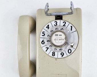 Téléphone mural rotatif blanc Stromberg Carlson 554B vintage avec grand numéro