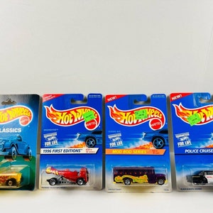 Kavel 4 -'98 en '95 Hot Wheels: T-Bucket, K-9, Mod-Bod Bus, Police Cruiser
