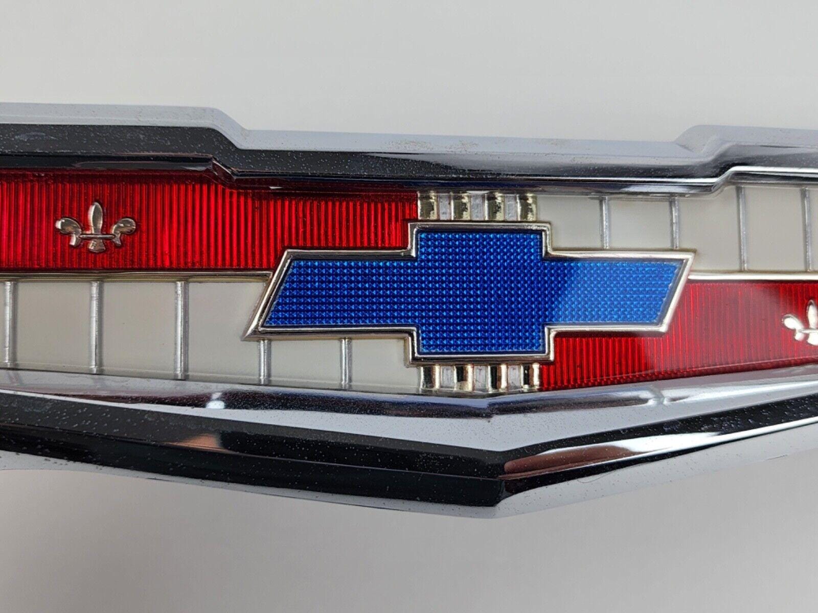 55 56 57 Chevy Trunk Emblem Badge GM Pair 3709914 NOS New Unused 