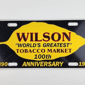 Wilson Tobacco NC 100th Anniversary License Plate Tag Black Tin Metal  Painted