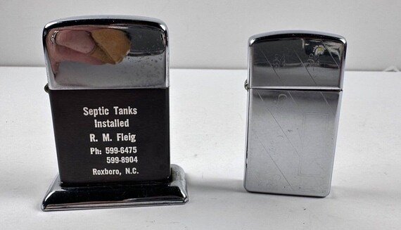 Lot 2 Lighters 1- Zippo 1- Unknown Advertising Septic Tank Lot 2 Lighters 1- Zippo 1- Unknown Advertising Septic Tank