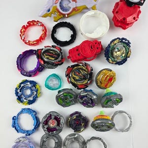 Beyblade Burst Takara Tomy Lot Metal & Plastic Launchers and Parts image 1