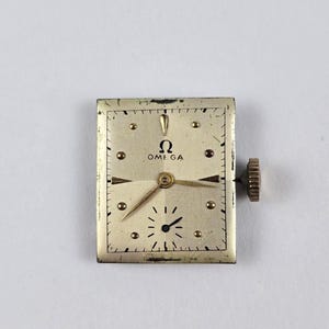 Movimiento de reloj Omega para hombre, estilo vintage de 1945, suizo, 17 rubíes, OXG, 19 mm x 22 mm. imagen 1