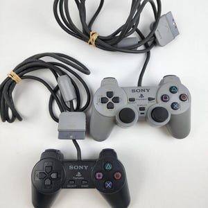Sony PlayStation PS1 Manette grise double amortisseur et noire SCPH-1080 SCPH-1200