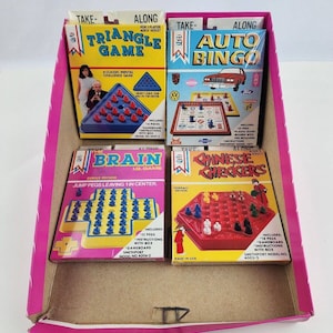 1986 Take-Along Store display w/ Travel games Checkers Auto Bingo Brain Triangle