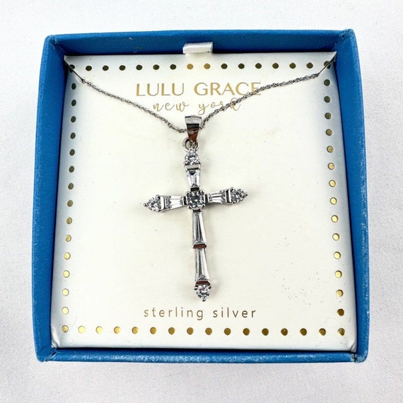 Cross Pendant with Blue and Clear Cubic Zirconia Stones Sterling Silver Cross Pendant with Blue and Clear Cubic Zirconia Stones Sterling Silver