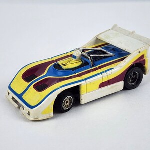 Aurora AFX Ultra 5 Porsche 510k Auto World Getest en met rolkooischeur