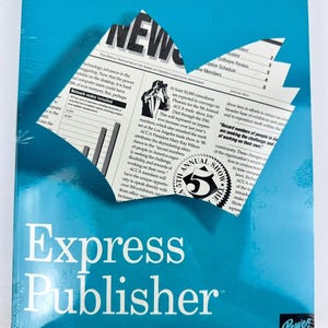 May include: A sealed Express Publisher 2.0 software box for MS-DOS. The cover is teal with the software title in white. A newspaper graphic is partially visible, with text about a trade show and the ACCA.