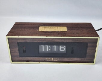 Vintage Wood Grain Flip Clock Lighted Dial Alarm IBM Badge Tested & working