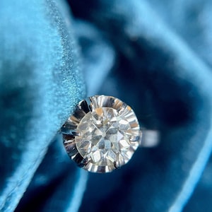 Antique Edwardian platinum old European cut diamond solitaire ring. Great for any occasion.