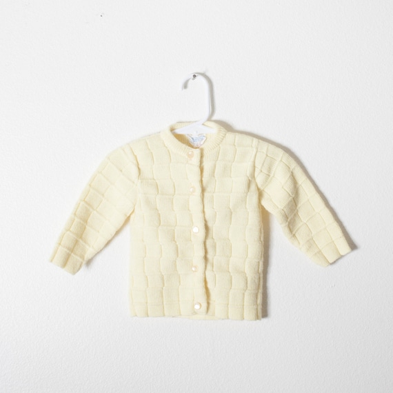 pale yellow cardigan sweater