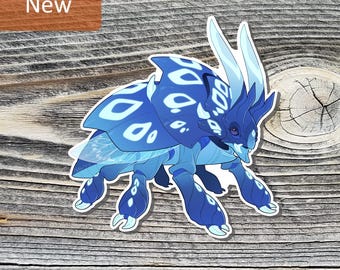 May include: A die-cut sticker featuring a stylized blue insect with large, curved antennae, segmented legs, and a patterned shell with light blue teardrop markings. The creature has a dark blue head with visible eyes and translucent wings.