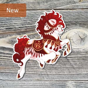 May include: A sticker featuring a white horse with red mane and tail, adorned with a decorative red and gold harness. The sticker has the word "New" in a brown rectangle in the upper left corner. The horse is set against a wood grain background.