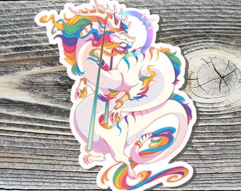 May include: A sticker featuring a white dragon with rainbow accents. The dragon has a long, serpentine body and is holding a teal spear. The dragon's mane and tail are a vibrant mix of colors, including red, orange, yellow, green, blue, and purple.
