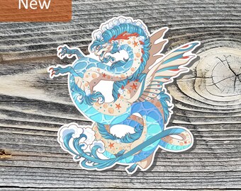 May include: A die-cut sticker featuring a serpentine dragon with blue and cream scales, patterned with orange starfish and seashells. The dragon has flowing blue hair, wings, and is surrounded by stylized white ocean waves and water ripples.