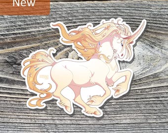 May include: A sticker featuring a cream-colored unicorn with a flowing mane and tail in shades of peach and gold. The unicorn has a long, spiraled horn and is decorated with small flowers. The word "New" is in a brown rectangle in the upper left corner.