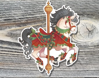 May include: A sticker featuring a carousel horse with a cream-colored body, adorned with a red and green saddle and decorative accents. The horse has a gray mane and tail, and is set against a wooden background.