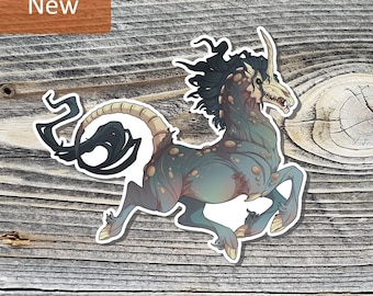 May include: A sticker featuring a dark teal creature with a skeletal horse head, a single horn, and a long segmented tail. The creature has a flowing black mane, tan spots on its body, and hooves. The word New is printed in a brown box.