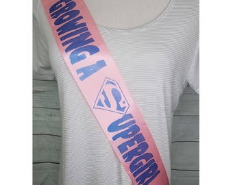 Growing a Superhero Sash, Super Girl Baby Shower for mommy to be to wear at Gender Reveal or Baby Sprinkle, Comes with a Rhinestone Pin