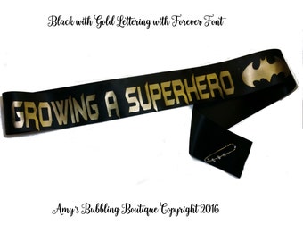 Growing a Superhero Sash, Batman Baby Shower for mommy to be to wear at Gender Reveal or Baby Sprinkle, Comes with a Rhinestone Pin