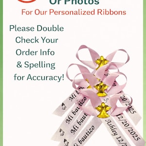 May include: A group of light pink ribbons featuring gold angel charms and printed text including 'Mi bautizo' and 'Ashley 12/20/2025'. The image includes text stating 'We Do Not Take Photo Proofs Or Photos For Our Personalized Ribbons' and 'Please Double Check Your Order Info & Spelling for Accuracy!'