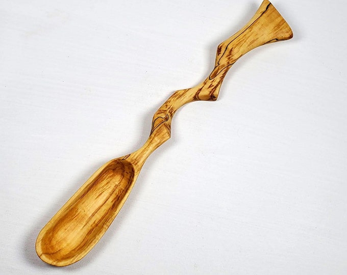 All natural hand carved wooden cooking spoon made of spalted maple Great for witch or wizard kitchen or fifth anniversary gift.