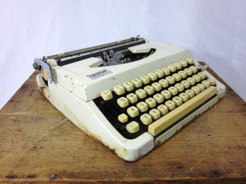 Image result for 1950's brother typewriter in case