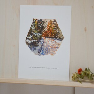 May include: A watercolor painting of a snowy forest path with a warm, golden light shining through the trees. The text "A winter breeze met warm sunlight" is printed below the image.