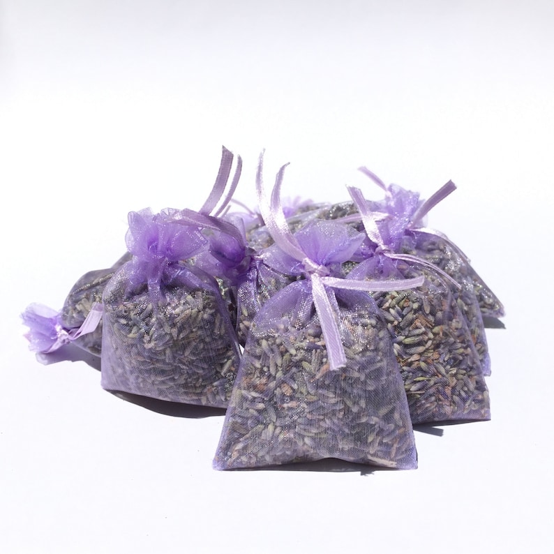 tiny organza bags filled with lavender flowers, twelve are included in the lavender drawer sachet set