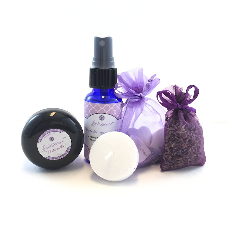 Lavender bath and body gift set contents include 2 ounce bath salts, spray mist, candle, mini soaps and 1 ounce spray mist