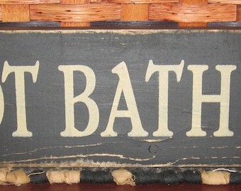 Primitive Hot Bath 25 cents sign