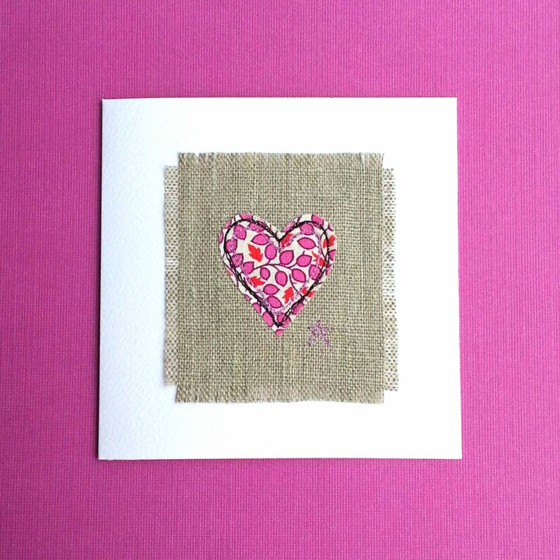In pure natural linen and white textured card. Linen anniversary greetings card for her Embroidered with pink floral heart design